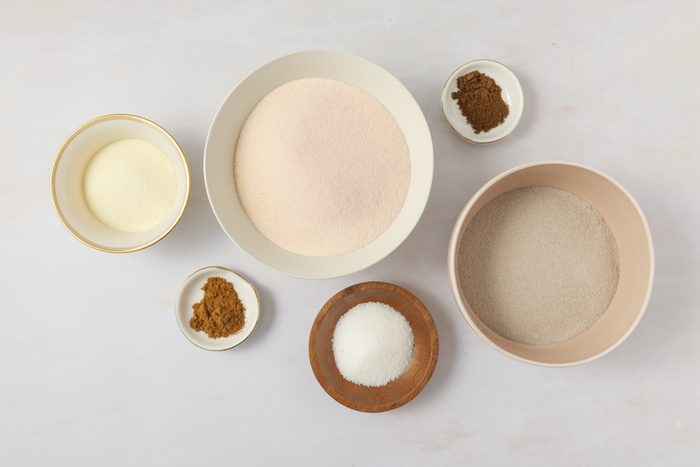 Ingredients for spiced tea on kitchen counter.