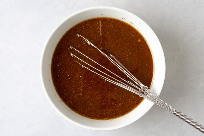 brown sugar, water, cider vinegar, ketchup, canola oil, salt, mustard, Worcestershire sauce, soy sauce and pepper combined in a bowl