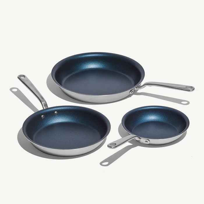 Three frying pans on a white background