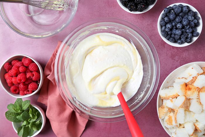 yogurt, cream cheese, sour cream and vanilla beat together in a bowl