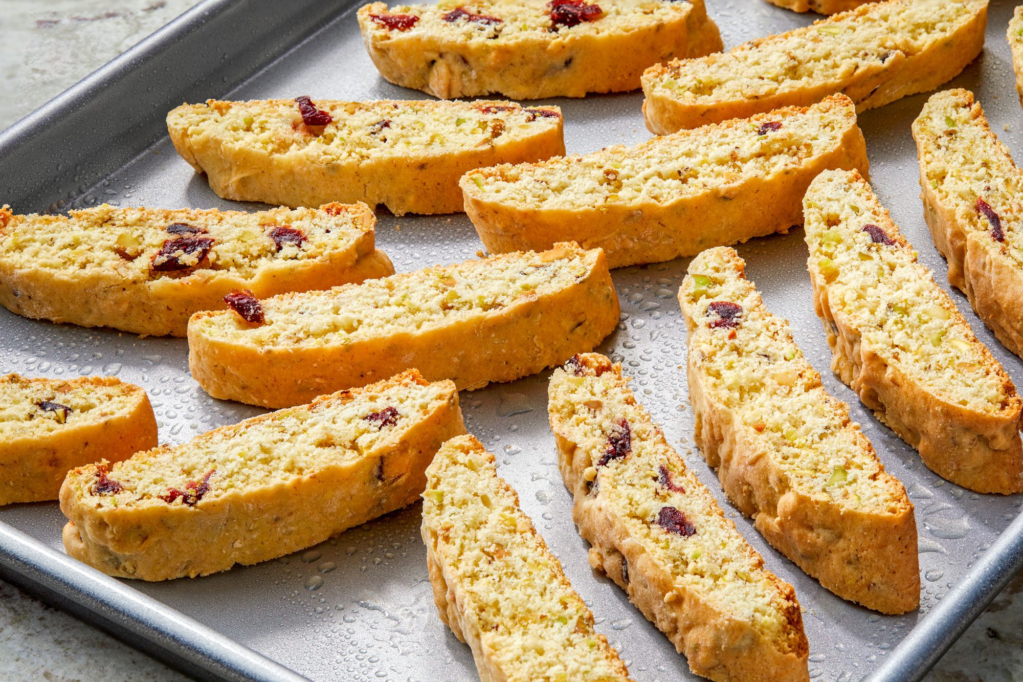 cut side down on ungreased baking sheets; bake for 12-14 minutes or until firm; remove to wire racks to cool; store in an airtight container