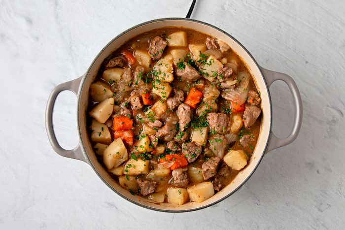 Stir in the parsley, chives, thyme, and meat and vegetables; heat through.