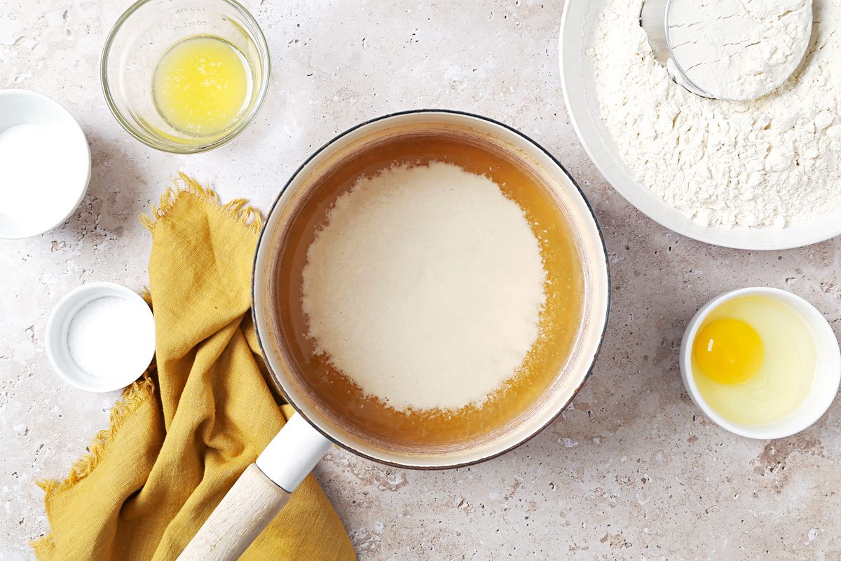 yeast stirred into hot beer in a saucepan