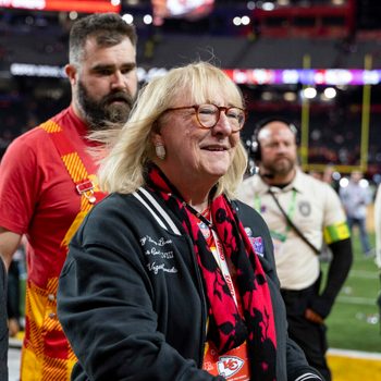 Donna Kelce on a football field with Jason Kelce in background
