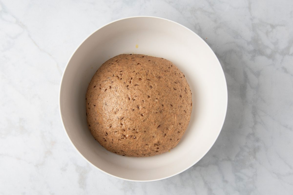 smooth dough in a greased bowl
