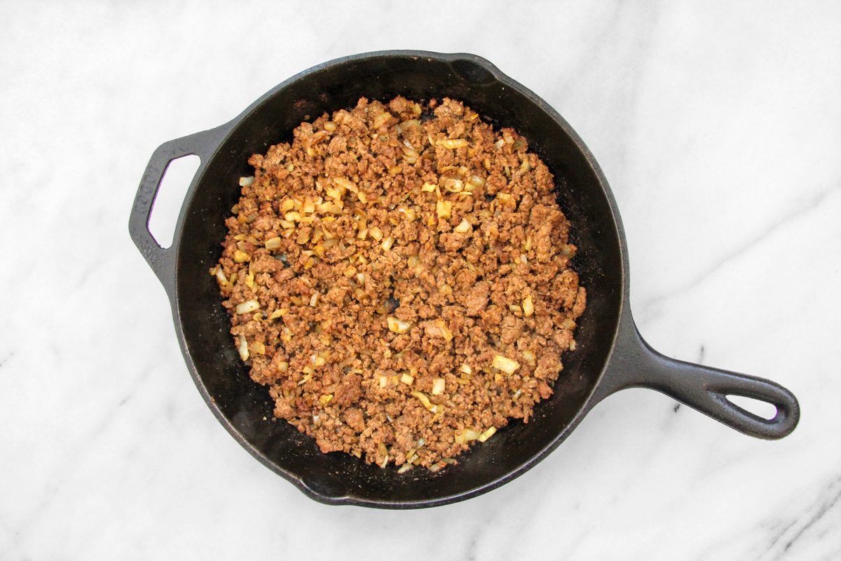 Overhead shot of cooking beef with other ingredients